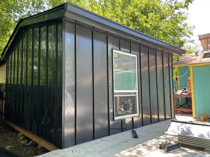 Black standing seam metal wall panels for Metal Roof Installation in McAllen