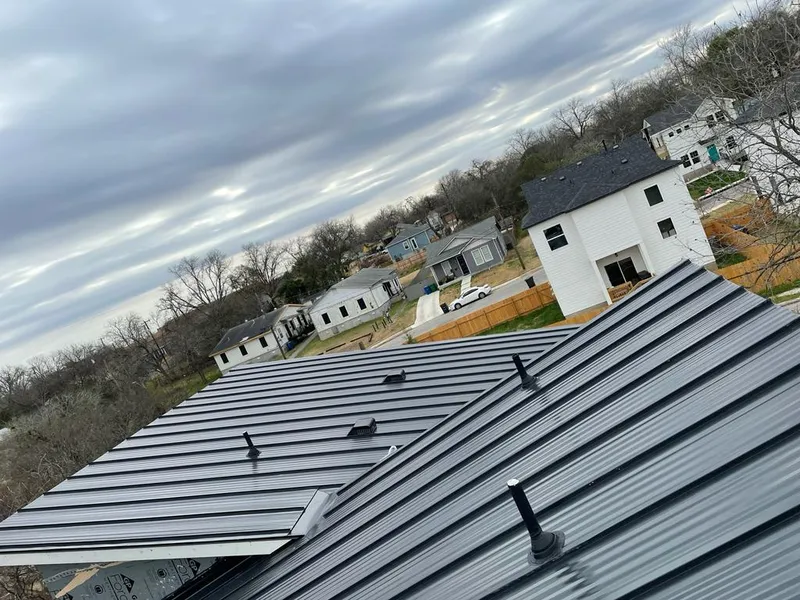 Standing seam metal roof panels with vents for Skylight Repair in McAllen